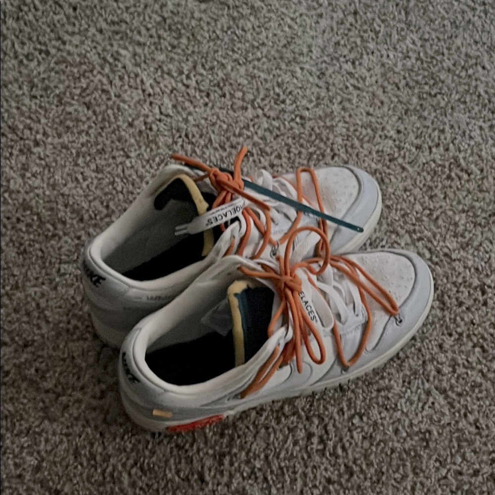 Men’s 9.5 white and orange luxury sneakers